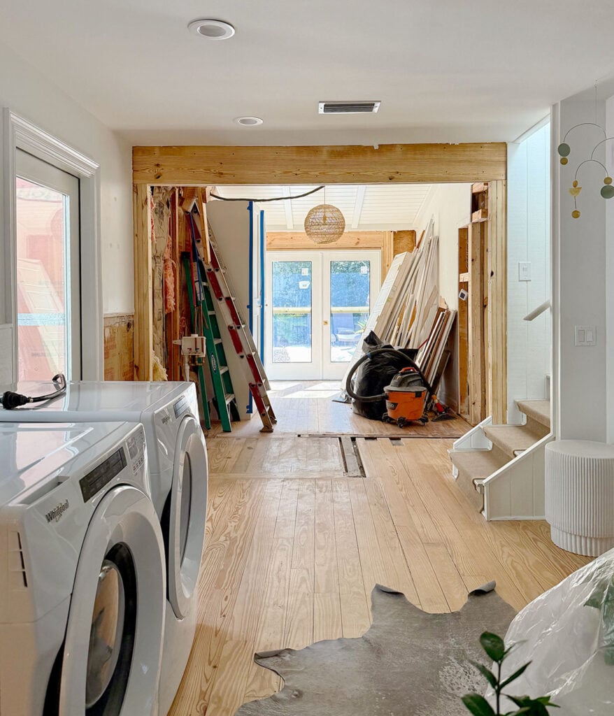 View Of Opened Wall To French Doors During Renovation