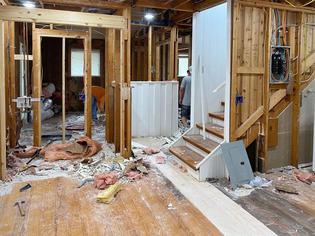 florida-house-progress-demo-stairs-laundry-1024x768-1 Renovation Photo With House That Has Exposed Beams And No Drywall And Dusty Floors