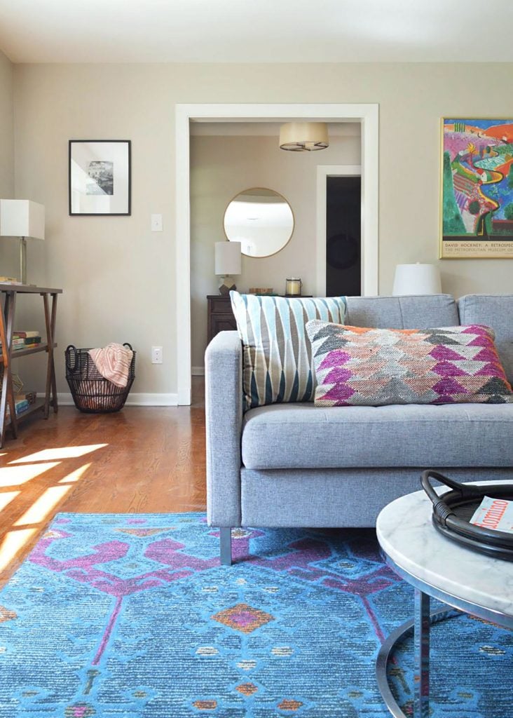 agreeable-gray-living-room-blue-rug-732x1024-1 Living Room With Blue Rug and Sherwin Williams Agreeable Gray Walls