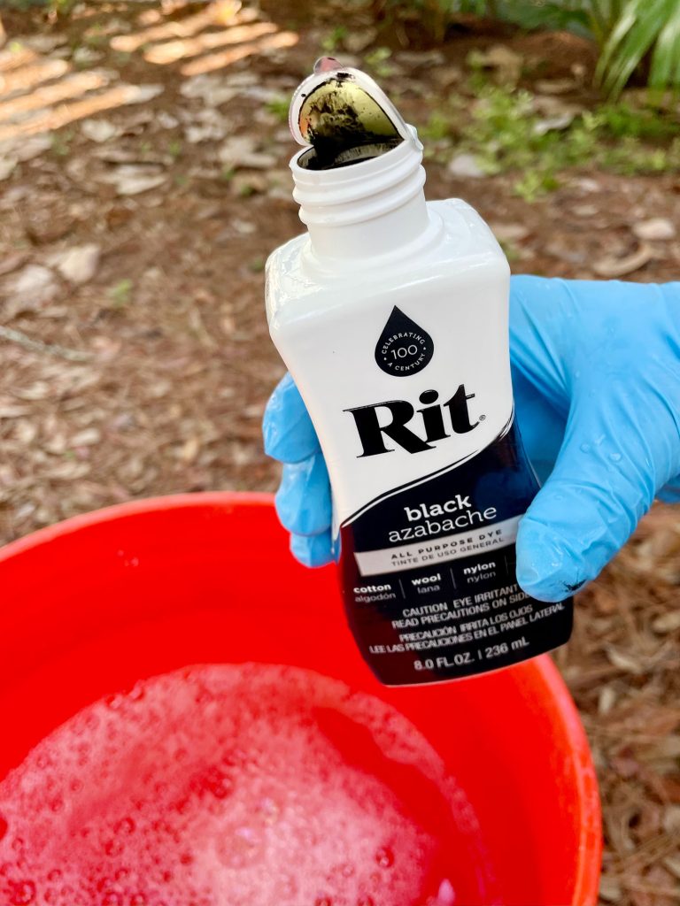 dye-clothes-rit-dye-bottle-open-768x1024-1 Bottle Of Black Rit Dye Over Bucket Of Hot Water
