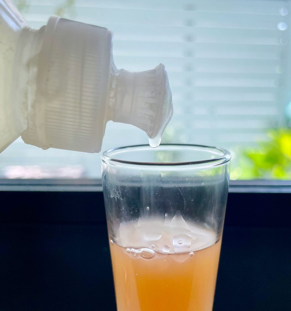 fruit-fly-trap-with-soap-958x1024-1 Dripping Dish Soap Into Apple Cider Vinegar For DIY Fruit Fly Trap