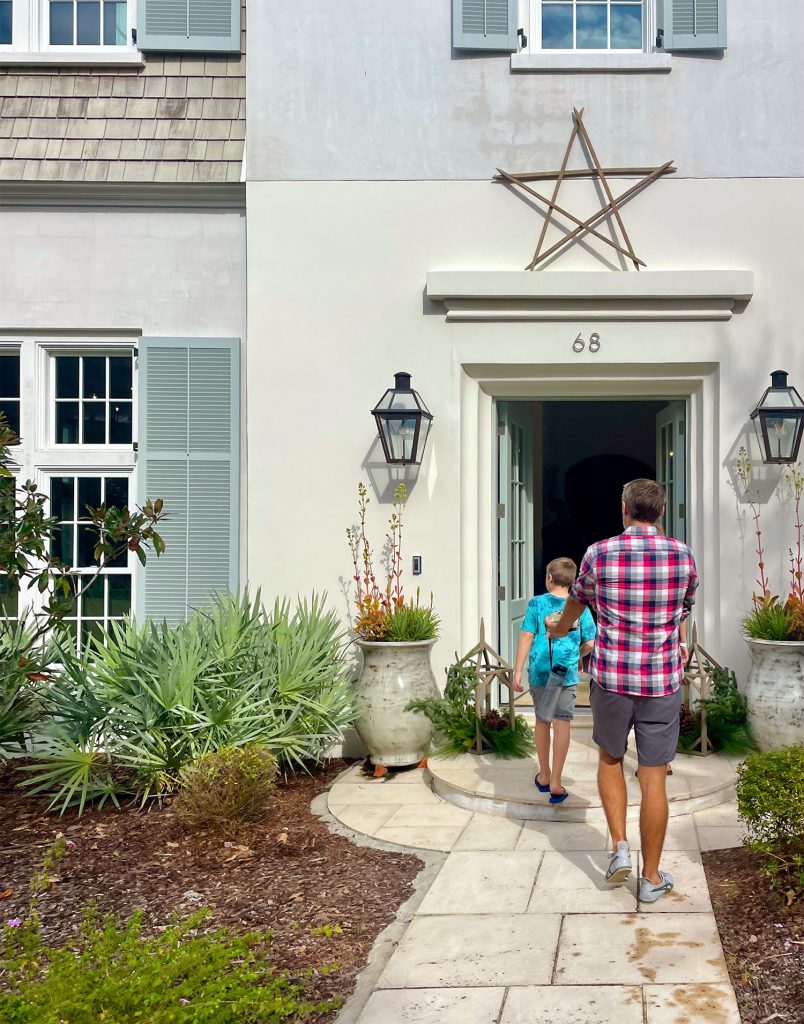 john-and-son-walking-into-open-house-804x1024-1 John and Son Walking Into Fancy Open House