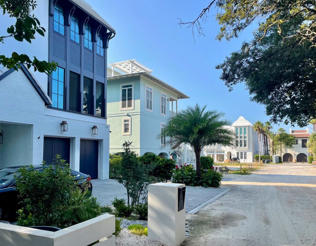 large-homes-on-street-1024x799-1 Multistory homes on street with palm trees