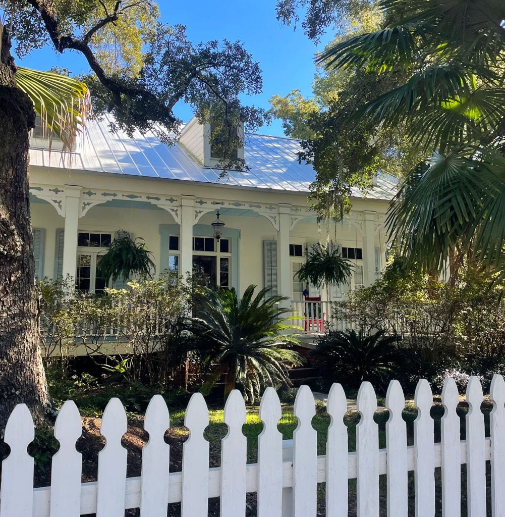ocean-springs-southern-home-2-1001x1024-1 Exterior of Southern Style Home In In Ocean Springs Mississippi With Picket Fence