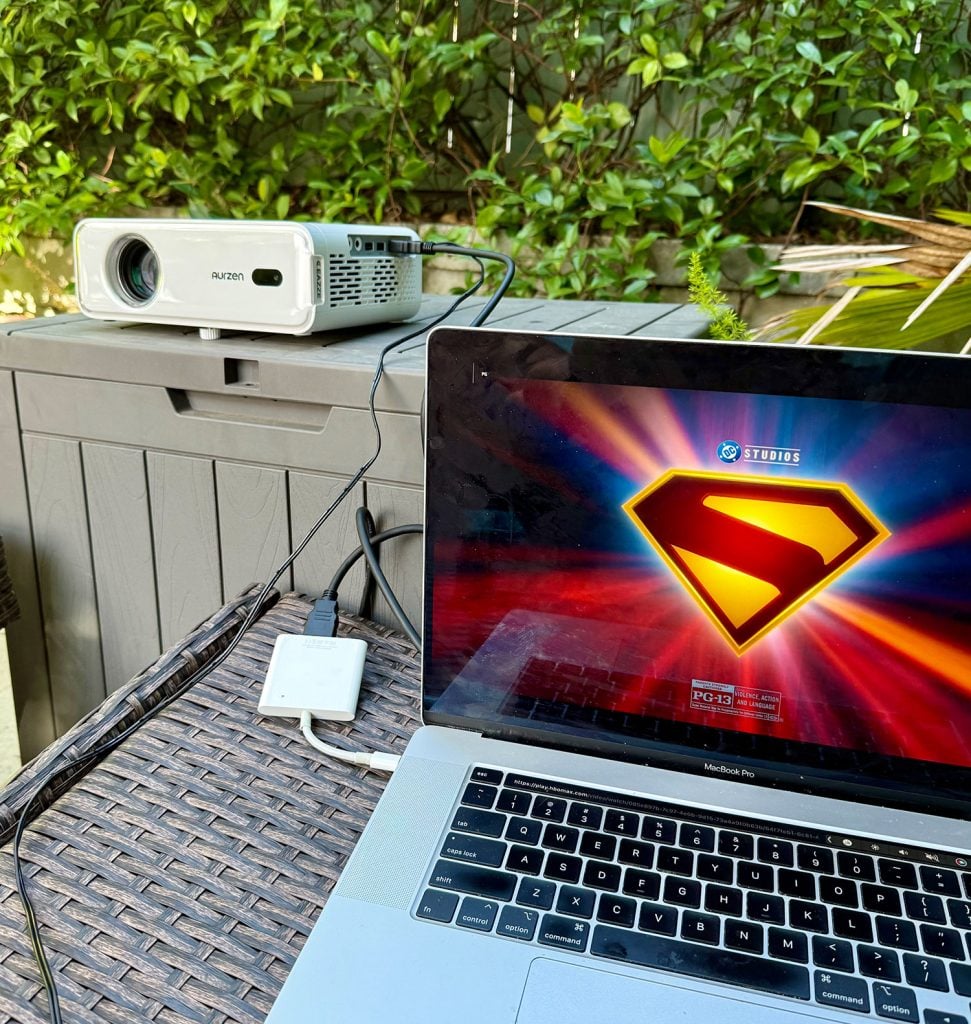 outdoor-movie-night-projector-conneted-to-laptop-971x1024-1 Laptop Connected To Outdoor Movie Projector via HDMI adapter