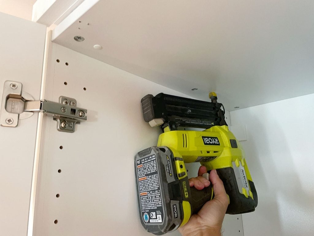 pax-wardrobe-nailing-from-inside-closet-1024x768-1 Nailing Backer Piece To Top Of Ikea Wardrobe Using Nail Gun