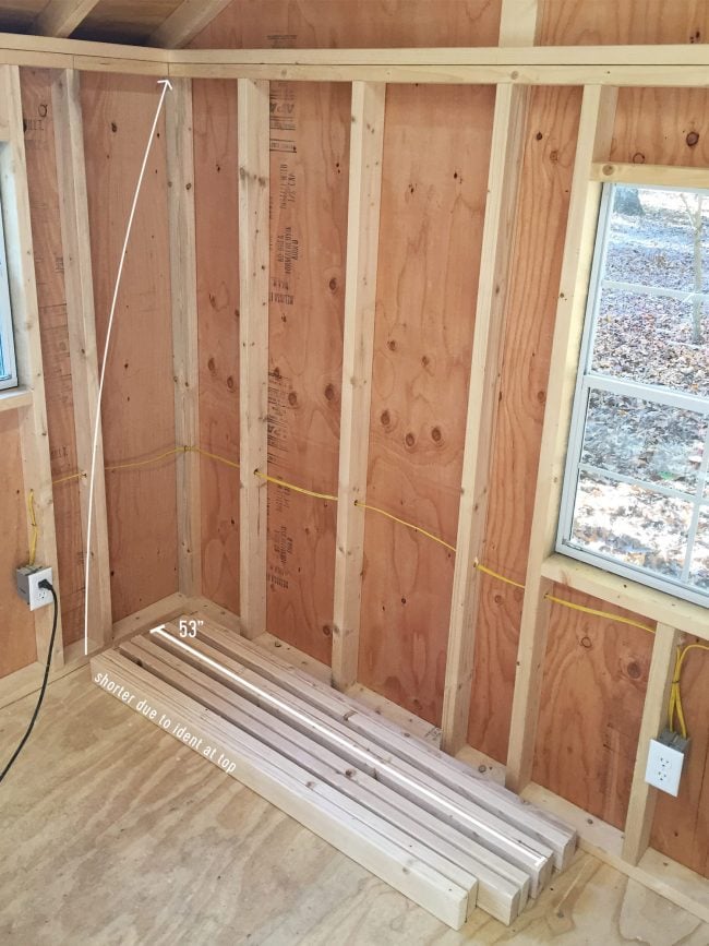 shed-storage-wood-shelves-cut-board-pairs-650x867-1 empty wall where garage shelving is going to go with 2x4s