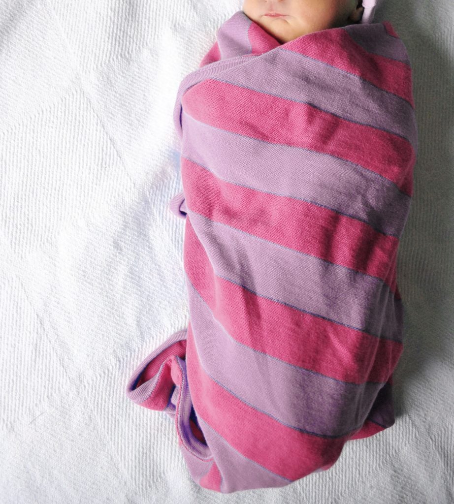 baby-girl-swaddled-in-pink-purple-blanket-922x1024-1 Newborn Baby Girl Swaddled In Pink Purple Striped Blanket