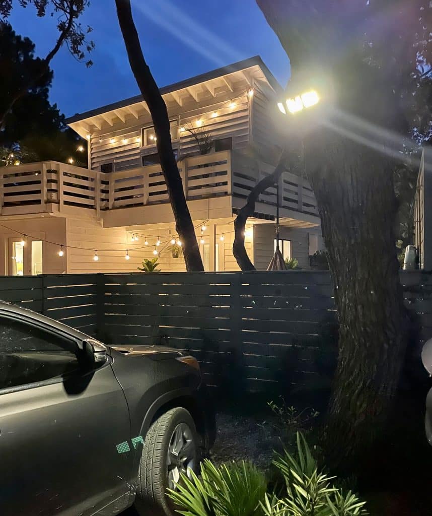 backyard-solar-flood-light-at-night-858x1024-1 Solar Flood Light Shining On Car At Night