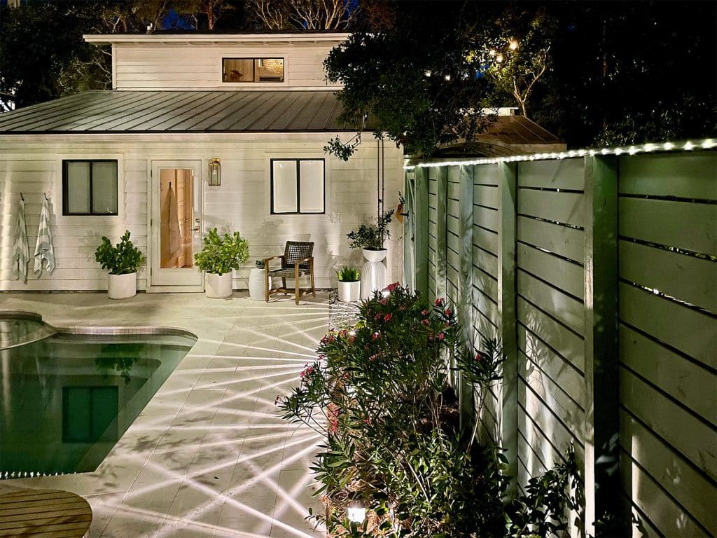 backyard-solar-lights-fence-at-night-1024x768-1 Solar LED Fairy Lights Along Top Of Fence Near Backyard Pool
