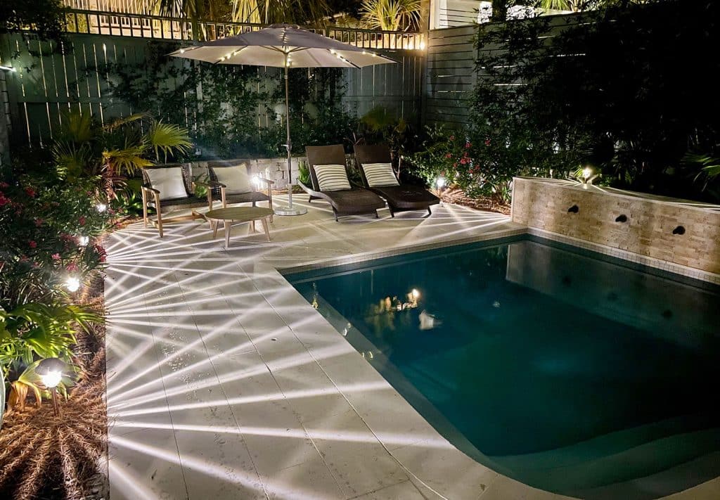 backyard-solar-lights-night-view-from-gate-1024x711-1 Backyard Pool Illuminated with LED Solar Pathway Lights