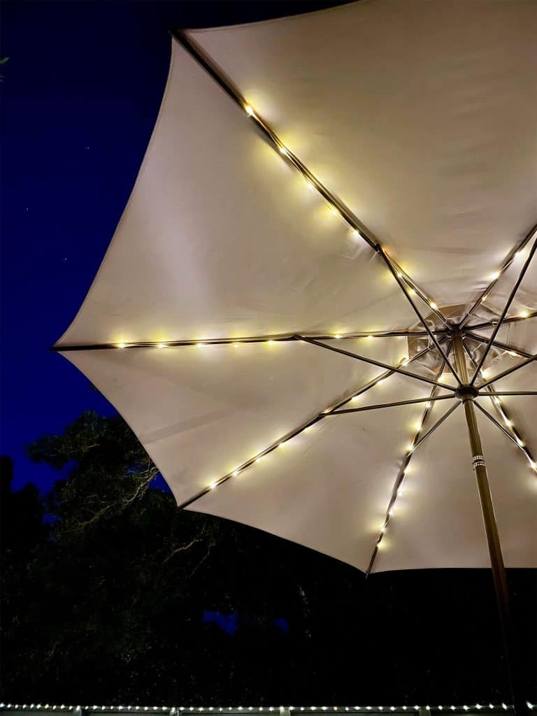 backyard-solar-lights-umbrella-upward-768x1024-1 Underside Of Patio Umbrella With Solar LED Lights At Night