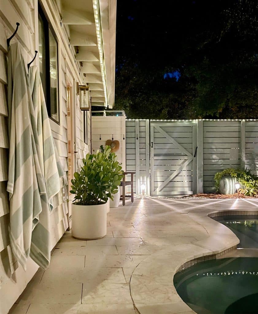 backyard-solar-lights-under-house-eave-841x1024-1 Solar LED Fairly Light Along Fence And Roof