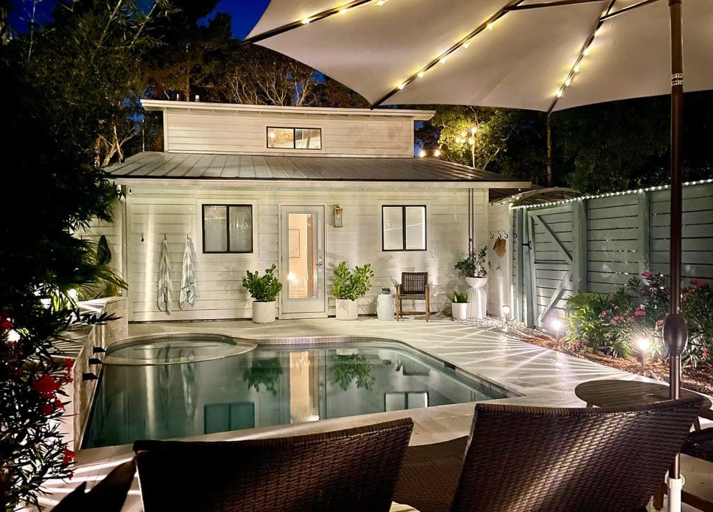 backyard-solar-lights-view-of-house-1024x735-1 Nighttime View Of Back of House With Pool And Solar LED Lighting