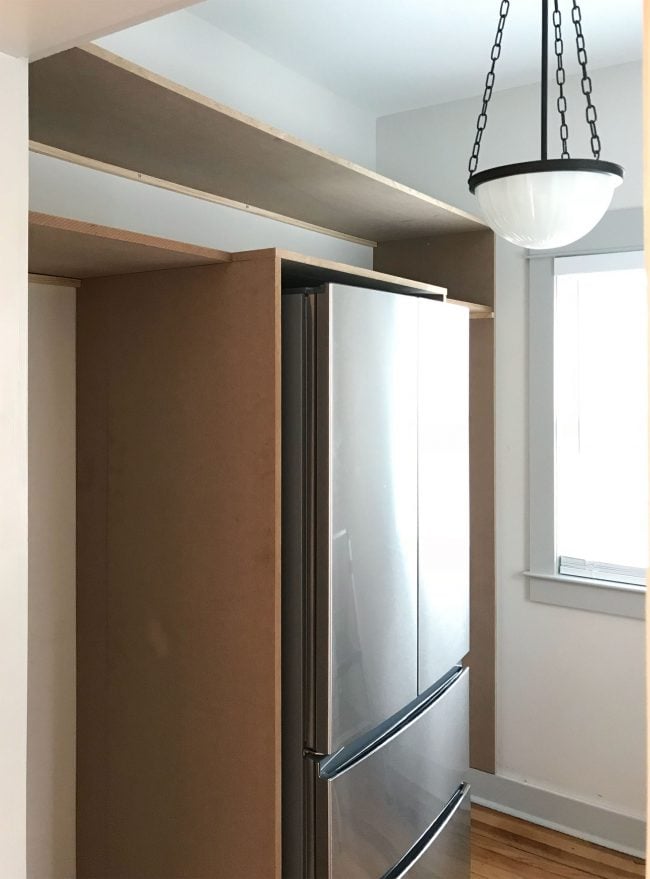 beach-beach-pantry-day-one-end-650x879-1 two long horizontal pantry shelves added on top of vertical pieces