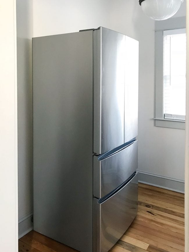 beach-house-pantry-before-with-fridge-650x867-1 apartment size refrigerator in walk in pantry before shelves