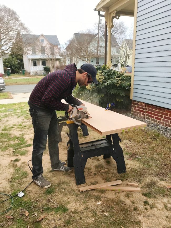 beach-house-pantry-john-cutting-outside-650x867-1 John cutting MDF panels outside