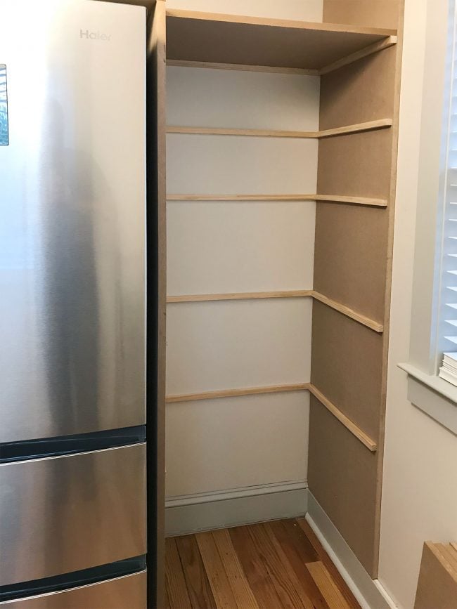 beach-house-pantry-side-shelf-supports-in-650x867-1 thin brace pieces added where pantry shelves will rest