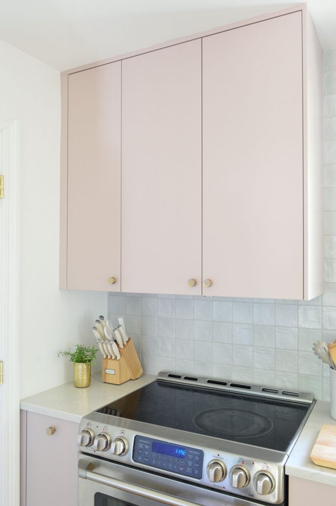 beachy-kitchen-hood-cabinet-closed-681x1024-1 Upper Cabinet In Painted Ikea Kitchen With Hidden Omsinnad Hood Over STove