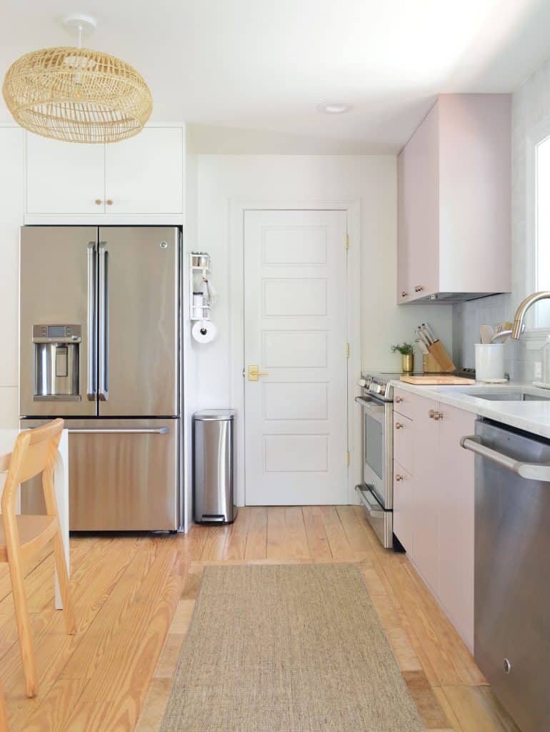 beachy-kitchen-towards-utility-closet-770x1024-1 Two Toned Ikea Kitchen Cabinets With Stainless Appliances