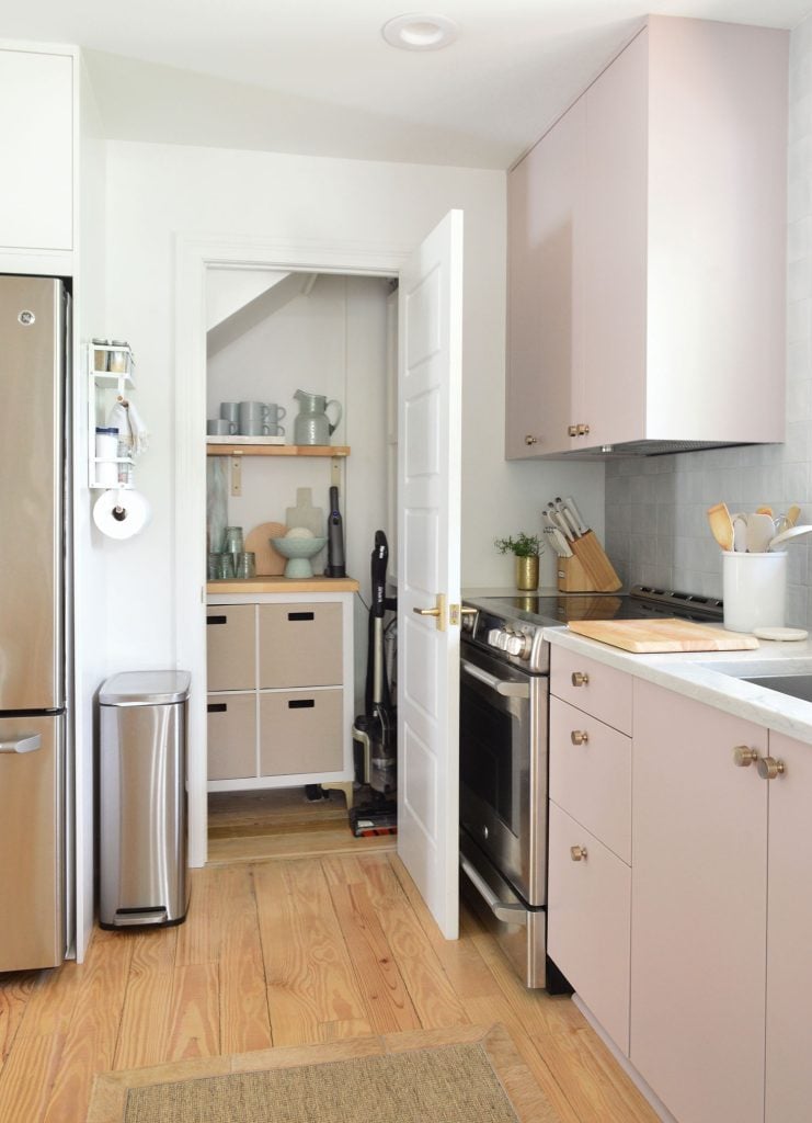 beachy-kitchen-utility-closet-closer-741x1024-1 Small Utility Closet Organized With Cube Storage And Open Shelving