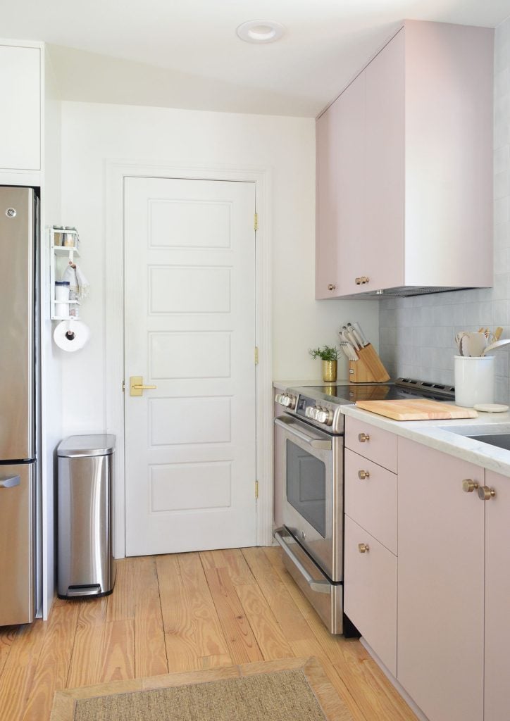 beachy-kitchen-utility-closet-closer-closed-724x1024-1 Mauve Ikea Kitchen Cabinets With Utility Closet Door Next To Stove