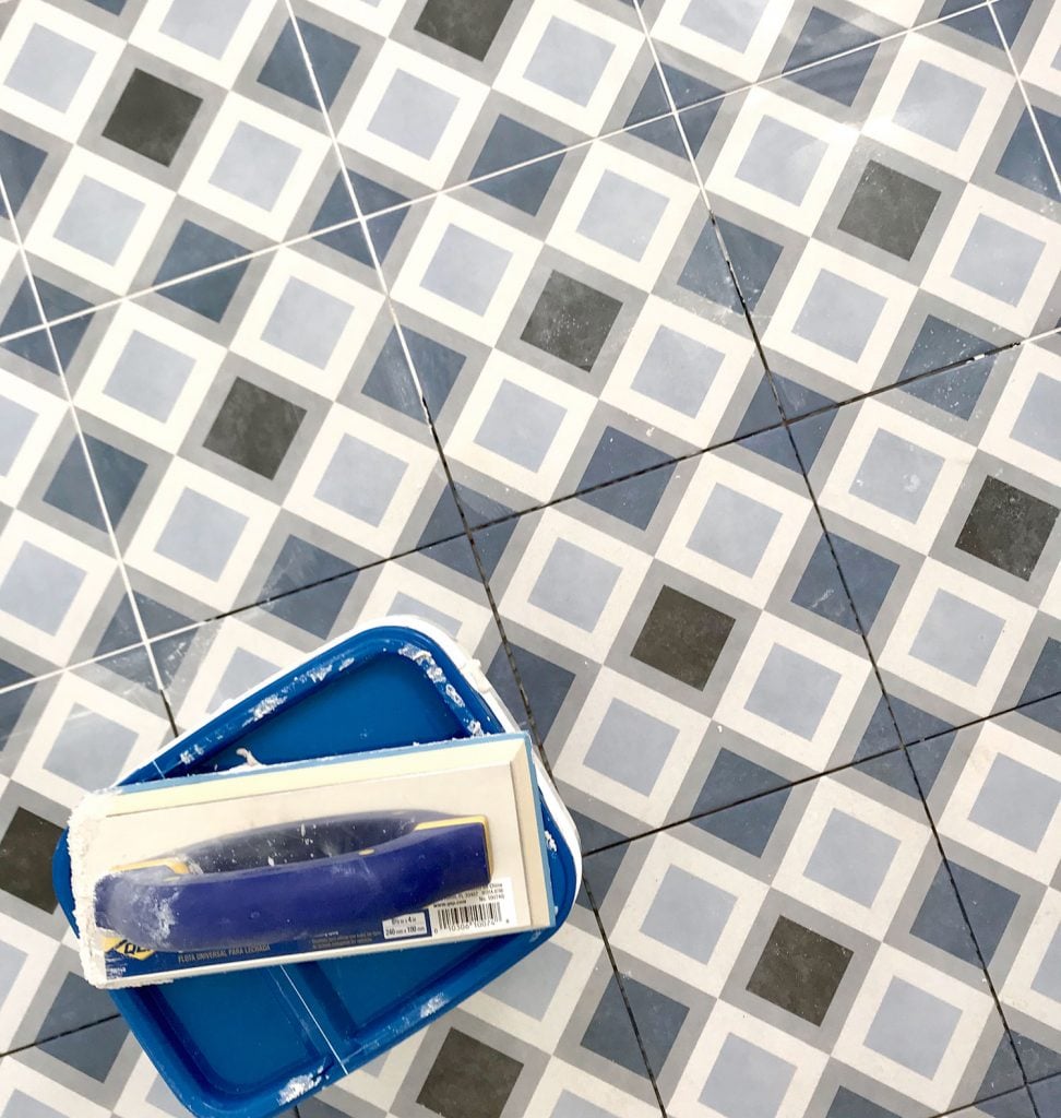 best-grout-blue-diamonds-frost-grout-972x1024-1 blue diamond floor tile getting grouted with frost color mapei flexcolor