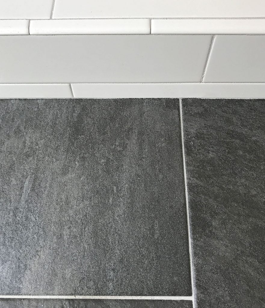 best-grout-mapei-warm-gray-on-different-tiles-881x1024-1 white subway tile shower next to dark slate floor with same gray grout