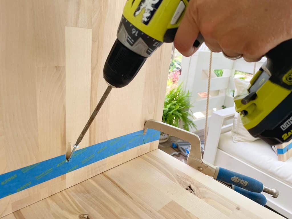 butcher-block-nightstand-screwing-sides-in-1024x768-1 Attaching Nightstand Leg Using Pocket Hole Screw From Inside