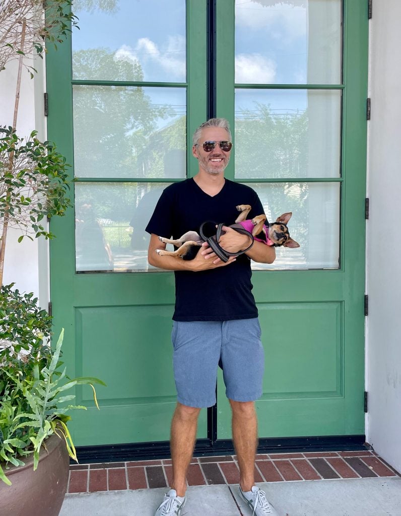 charleston-south-carolina-john-carrying-penny-796x1024-1 John Holding Penny The Chorkie In Charleston South Carolina