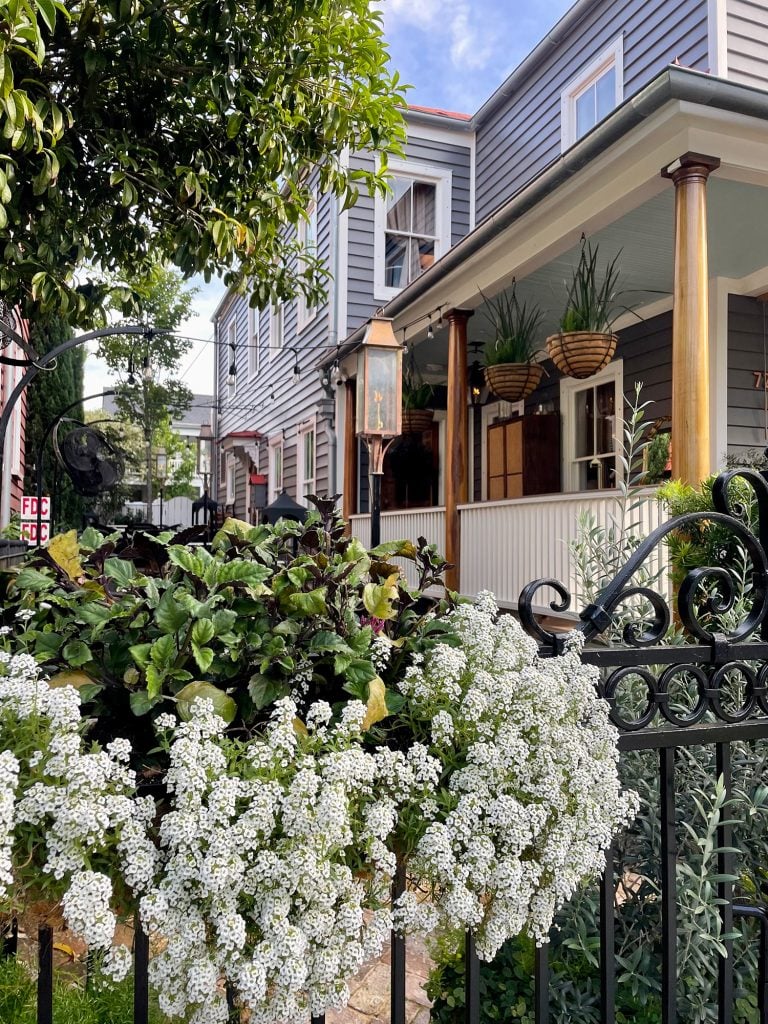 charleston-south-carolina-southbound-with-flowers-wood-columns-768x1024-1 Southbound Restaurant In Charleston South Carolina