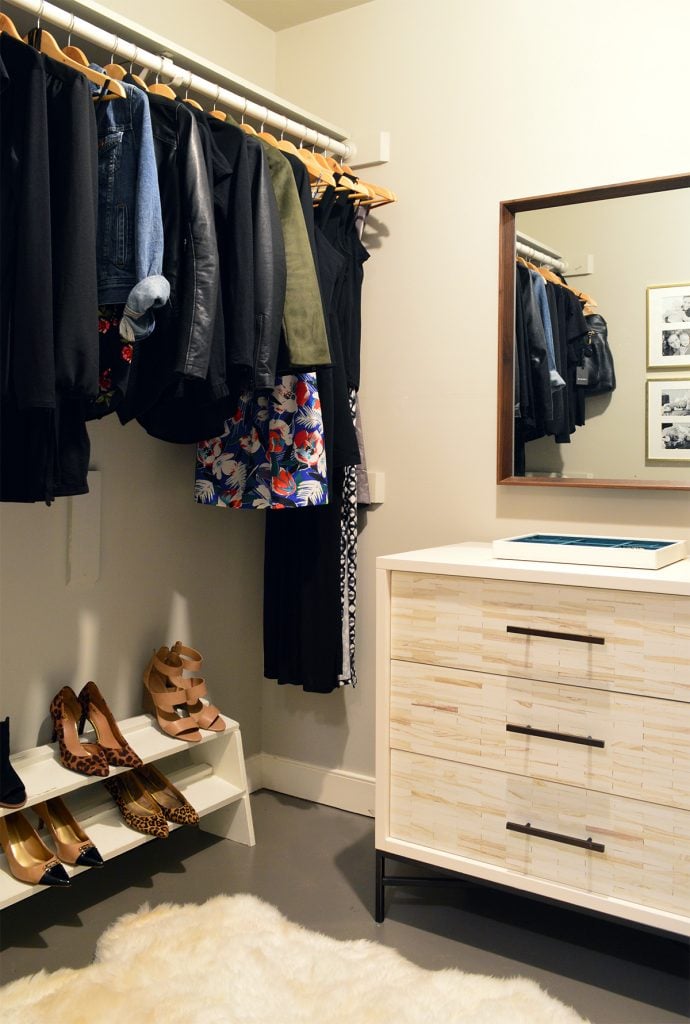 closet-wardrobe-sherry-side-no-sherry-690x1024-1 Walk in closet before renovation with dresser and hanging clothes bar