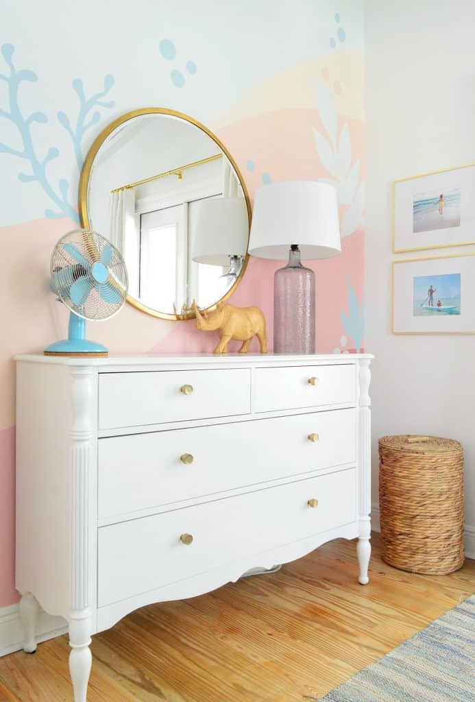 colorful-wall-mural-after-coral-dresser-693x1024-1 Beachy abstract mural in girls bedroom with traditional dresser and gold mirror