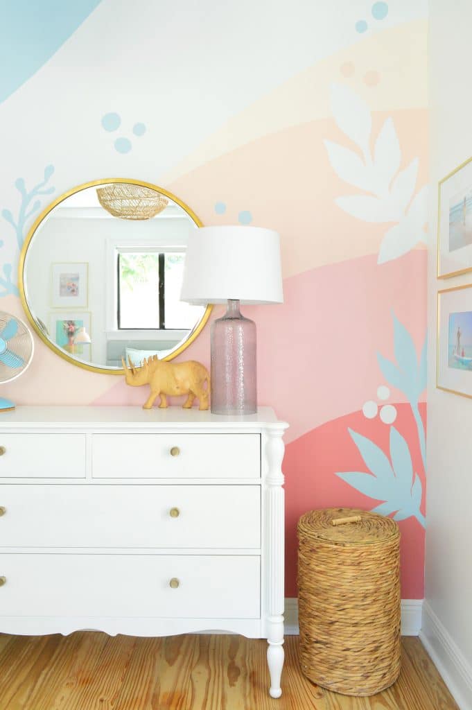 colorful-wall-mural-after-coral-straight-at-hamper-681x1024-1 Girls room with large abstract mural with pink blue coral stripes
