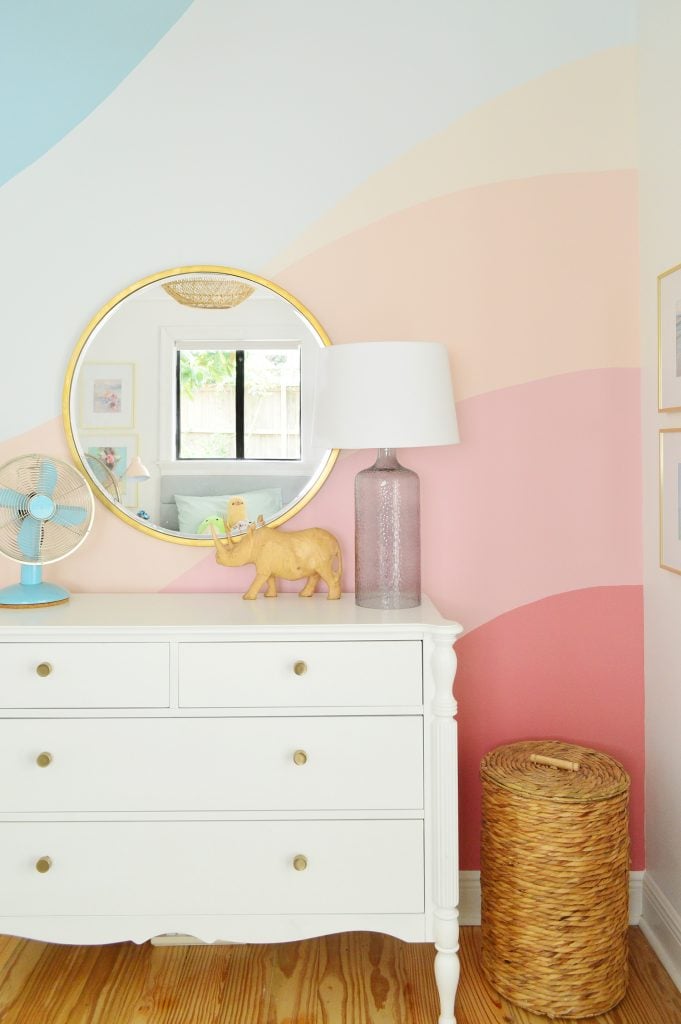 colorful-wall-mural-after-dresser-straight-681x1024-1 Colorful striped abstract mural in gradient from blues to pinks