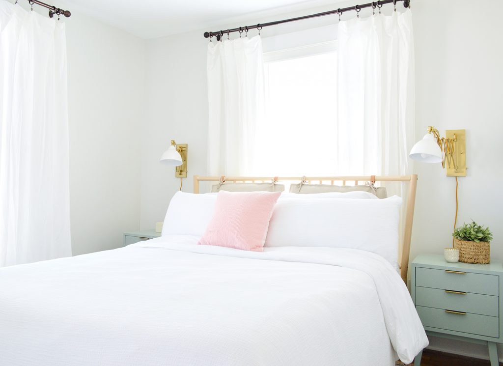 duplex-bedroom-pink-front-full-bed-1024x745-1 Duplex guest bedroom with bed in front of window