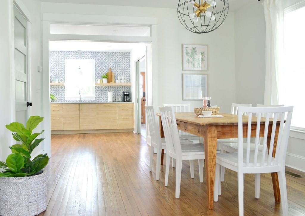 duplex-dining-room-blue-full-to-kitchen-1024x724-1 Duplex Dining Room With Blue And Wood Kitchen In Background