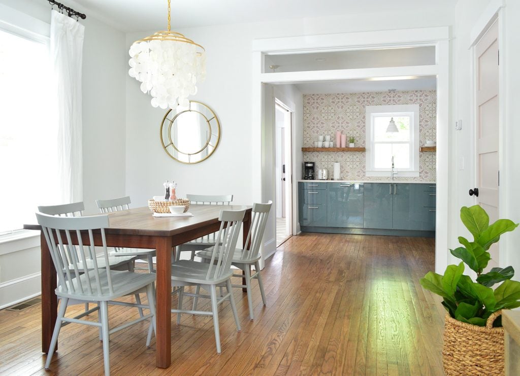 duplex-dining-room-pink-full-to-kitchen-1024x741-1 Bright Dining Room With Capiz Chandelier Looking Into Pink And Blue Kitchen