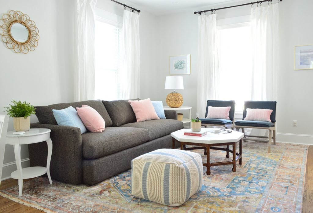 duplex-living-room-blue-to-seating-area-1024x698-1 Duplex Living Room With Neutral Traditional Rug Crate And Barrel Sofa