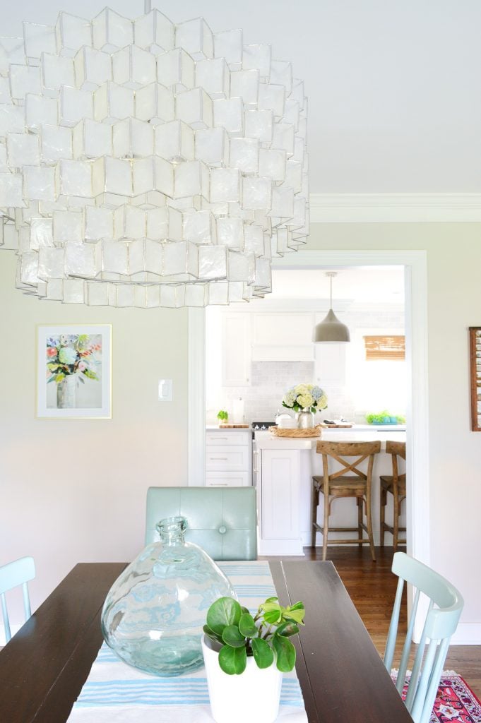 ep40-dining-light-fixture-681x1024-1 Capiz light fixture in dining room with large glass vase