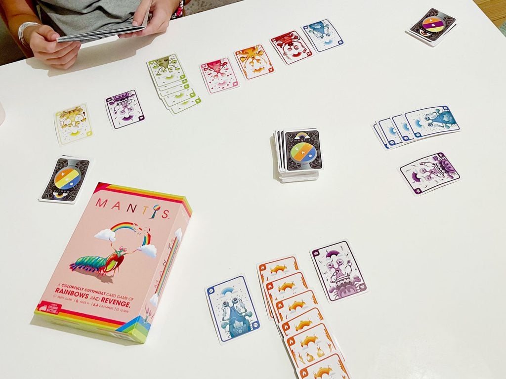 favorite-family-board-games-mantis-1024x767-1 Mantis Colorful Card Game Being Played On Table