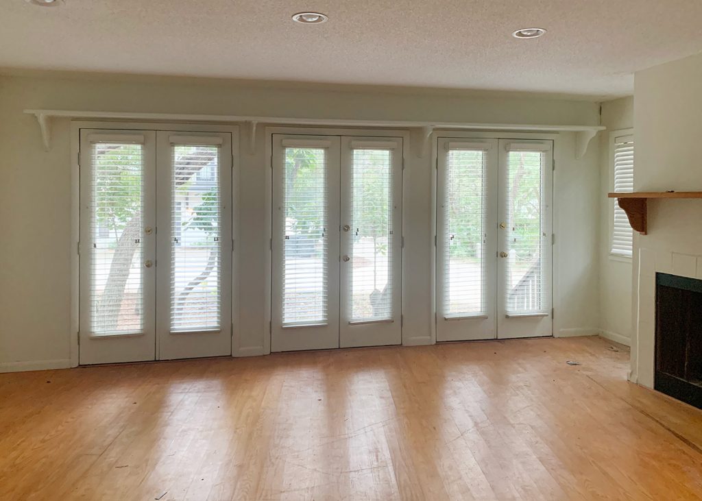 florida-before-master-bedroom-towards-double-doors-1024x731-1 Before photo of wall of french doors in bedroom