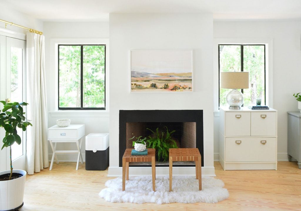 florida-fireplace-painted-black-full-straight-1024x720-1 Bedroom fireplace shortly after moving with random furniture along the wall