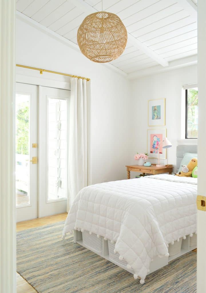 florida-girls-bedroom-with-door-frame-720x1024-1 Girls bedroom with vaulted plank ceiling and woven light fixture