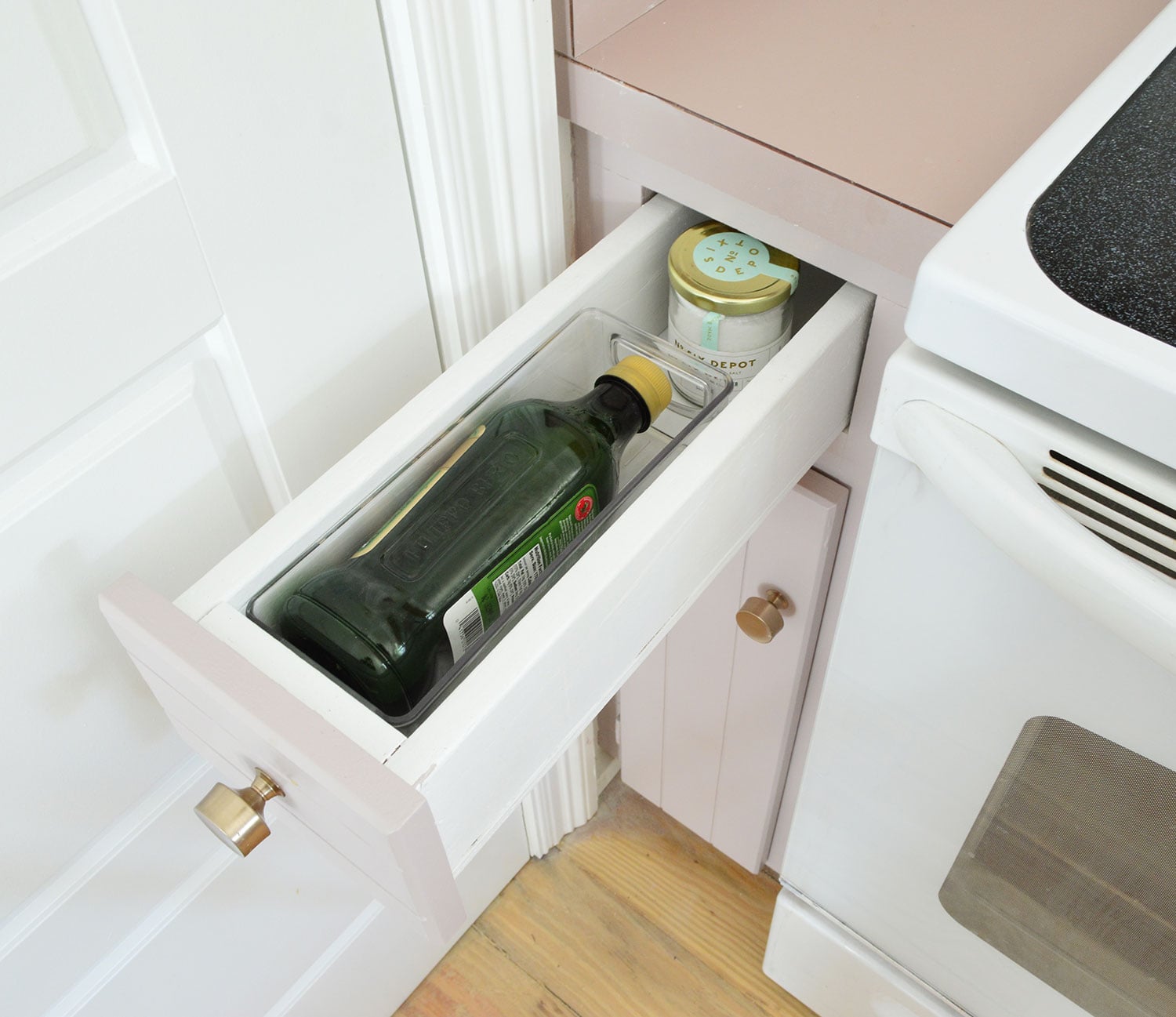 florida-kitchen-organization-oil-drawer Before Photo Of Narrow Drawer Wide Enough To Only Fit One Oil Bottle