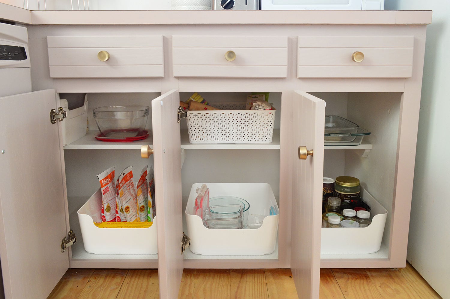 florida-kitchen-organization-three-cabinets-open Three Lower Cabinet Opened To Show Narrow Storage Capabilities