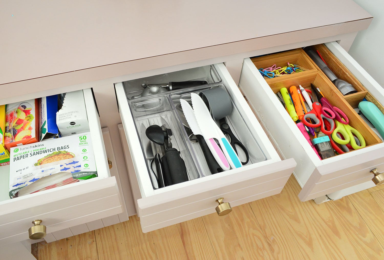 florida-kitchen-organization-three-drawers Three Drawers Open In Mauve Cabinets To Show Slim Organization Options