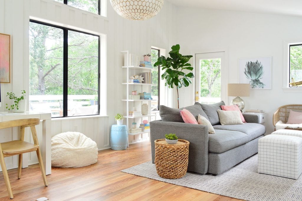 florida-living-room-update-horiztontal-1024x681-1 Wide Shot of Upstairs Living Room With Big Windows To Trees