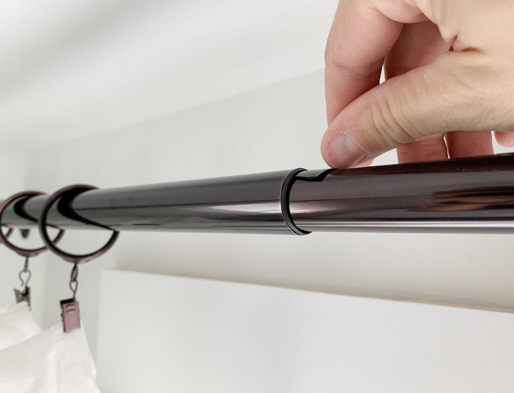 hanging-curtain-rods-sag-hack-1024x782-1 Putting small plastic wedge in curtain rod to prevent sagging