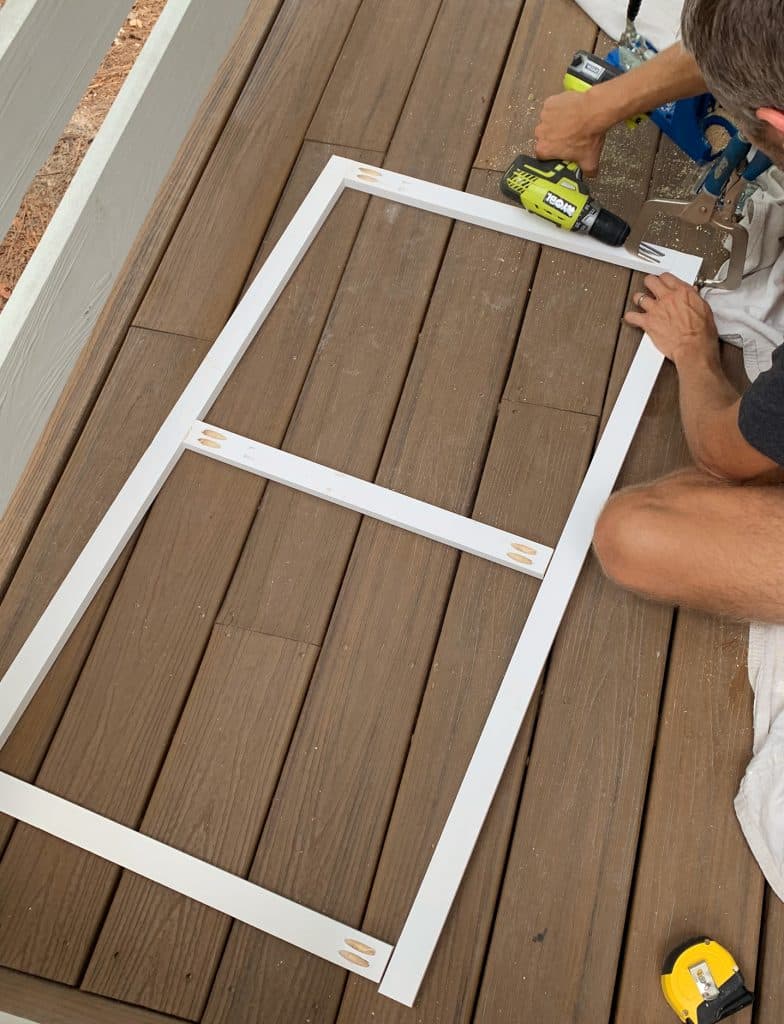 headboard-diy-john-making-first-frame-784x1024-1 John building simple wood frame with 1x2 boards and pocket holes in figure 8 shape